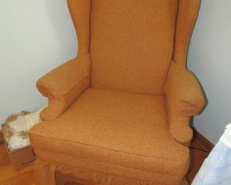 one of a pair of super solid wingback chairs