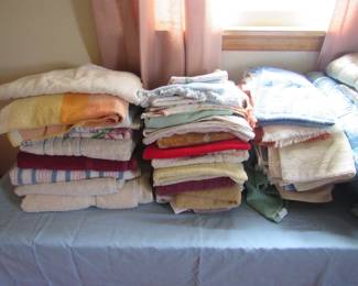 TONS of towels, sheets and other linens