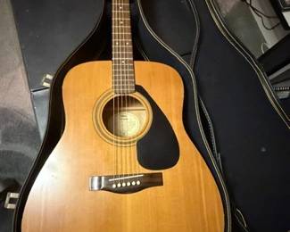 Yamaha FG-300A guitar in hard case. 