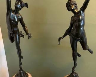 Vintage French bronze sculptures on marble bases. 
