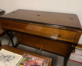 1930's Wurlitzer Spinet / cabinet piano. With matching stool. 
