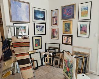 Framed art and vintage blankets