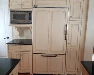 Kitchen features a GE Monogram refrigerator 