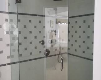 Glass shower surround; shower hardware