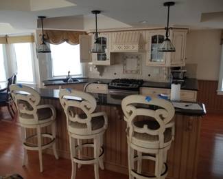 Custom kitchen cabinetry by Kountry Kraft. Bar stools - 3 available 