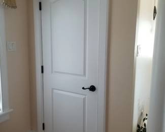 Interior doors with updated oiled bronze hardware