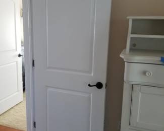 Interior doors with updated oiled bronze hardware