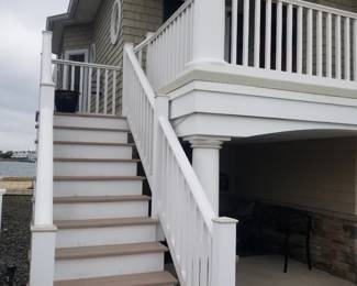 Tan Trex decking; vinyl railing; Azek