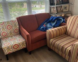 Loveseat, chairs, artwork