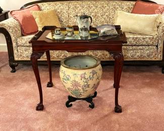 Formal living room with vintage/antique furnishings.  Oriental fish bowl