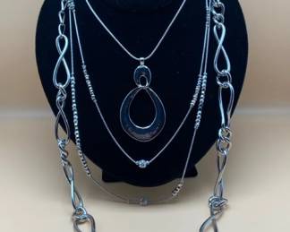 Ladies Silvertone Contemporary Necklaces