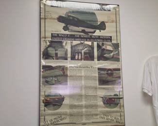 Framed advertisement poster for the Waco Model E airplane, highlighting it as a premier luxury aircraft of its era