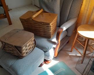 Upholstered chair and futon and picnic baskets