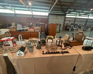 Farmhouse decor, candle sticks and votives, baskets and wall decor.