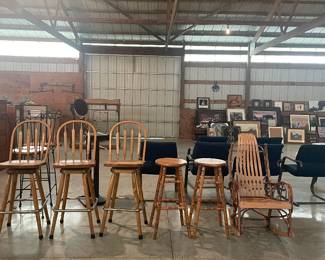 Different view of the wooden barstools and also an antique rocking chair.  