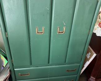Crafting supply cabinet filled with sewing supplies