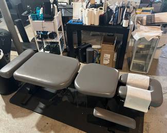 Chiropractic adjustment table with lumbar drop