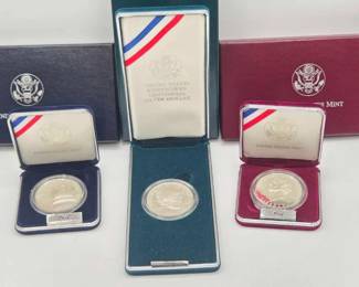 703  90 Silver Commerative Silver Dollars