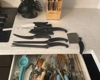 Sharp Knives And Kitchen Utensils