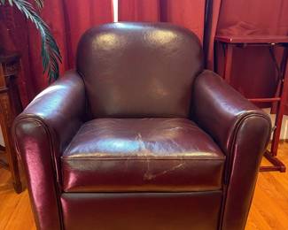 R2 - $40. Leather Swivel Chair. Brown. Measures 33" wide x 31" deep x 32" tall. Floor to seat is 18".  Seat has some cracking - arms and back are in good condition. 