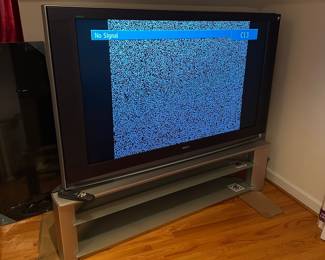R90 - FREE. YOU MUST MOVE off the 3rd story. It's free if you can move it. Sony LCD Projection TV. 2005 Model. Model # KDF-E60A20. 