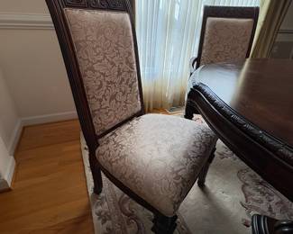 R11 - $750. Michael Amini Signature Series by AICO Hazelnut “Villagio” table & chairs wood dining table set & china cabinet.  Table does have some surface scratches and Table has 6 upholstered chairs and extendable leaf for flexible sizing. Chairs have leaf patterned fabric seats and backs, with carved wood frames.  DIMENSIONS:   Table w/ leaf 84” L x 60” W x 31”H  Leaf 24”W  Arm Chair  Seat 27.25”W x 24.25 D x 45”H  Side Chair Seat 24”W x 24.25 D x 45”H Floor to seat 19”  China Cabinet  Dimensions: 88 1/2"H x 66"W x 19"D Features Built in 3-mood touch lighting system