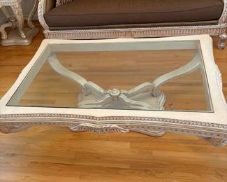 R10 - $1500. Benneti Italia Elegant Living Room Set. Oversized. Has ornate carved wood frames. Includes a comfy sofa, two armchairs, a coffee table with a glass top, and glass top side table. Upholstery is in brown and gold tones. Comes with decorative pillows.  DIMENSIONS:   Sofa approx. 8ft L x 3ft D x 4ft H. Large side chair 60”W x 38”D x 48”H.  Accent chair 31”W x 29”D x 45”H.  Side table 38”W x 38”D x 28”H.  Coffee table 63”L x 41”W x 19.5”H 