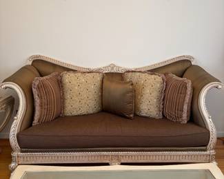 R10 - $1500. Benneti Italia Elegant Living Room Set. Oversized. Has ornate carved wood frames. Includes a comfy sofa, two armchairs, a coffee table with a glass top, and glass top side table. Upholstery is in brown and gold tones. Comes with decorative pillows.  DIMENSIONS:   Sofa approx. 8ft L x 3ft D x 4ft H. Large side chair 60”W x 38”D x 48”H.  Accent chair 31”W x 29”D x 45”H.  Side table 38”W x 38”D x 28”H.  Coffee table 63”L x 41”W x 19.5”H 