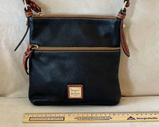 R50 - $30. Vintage Dooney & Bourke Pebble Grain Leather Crossbody Purse. Measures 8.5" x 8.25".  Clean inside. 
