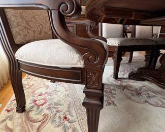 R11 - $750. Michael Amini Signature Series by AICO Hazelnut “Villagio” table & chairs wood dining table set & china cabinet.  Table does have some surface scratches and Table has 6 upholstered chairs and extendable leaf for flexible sizing. Chairs have leaf patterned fabric seats and backs, with carved wood frames.  DIMENSIONS:   Table w/ leaf 84” L x 60” W x 31”H  Leaf 24”W  Arm Chair  Seat 27.25”W x 24.25 D x 45”H  Side Chair Seat 24”W x 24.25 D x 45”H Floor to seat 19”  China Cabinet  Dimensions: 88 1/2"H x 66"W x 19"D Features Built in 3-mood touch lighting system