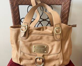 R43 - $35. Michael Kors Hudson Tan Leather Purse. Measures 16" x 4" deep x 11" tall. 