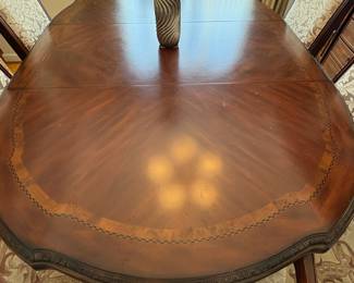 R11 - $750. Michael Amini Signature Series by AICO Hazelnut “Villagio” table & chairs wood dining table set & china cabinet.  Table does have some surface scratches and Table has 6 upholstered chairs and extendable leaf for flexible sizing. Chairs have leaf patterned fabric seats and backs, with carved wood frames.  DIMENSIONS:   Table w/ leaf 84” L x 60” W x 31”H  Leaf 24”W  Arm Chair  Seat 27.25”W x 24.25 D x 45”H  Side Chair Seat 24”W x 24.25 D x 45”H Floor to seat 19”  China Cabinet  Dimensions: 88 1/2"H x 66"W x 19"D Features Built in 3-mood touch lighting system