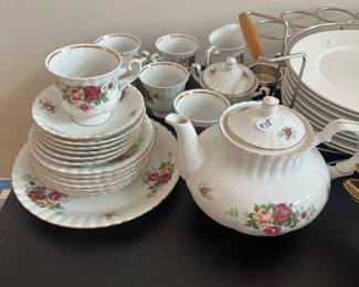 R68 - $30. Floral Tea Set. 