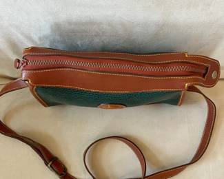 R48 - $30. Vintage Dooney & Bourke Green & Tan Crossbody Bag. Measures 10" wide x 7" tall x 3" deep. 
