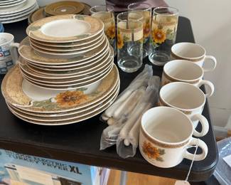 R69 - $30. Sunflower China Set. 