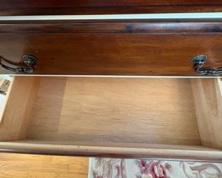 R12 - $125. Chest of Drawers / Dresser. Measures 40.25" x 20" deep x 50.25" tall. All drawers slide. Has been used in a dining room for extra linen storage. 