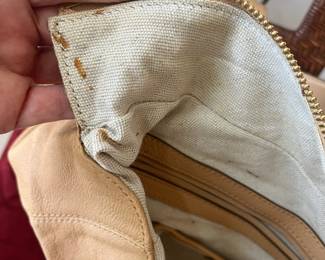 R43 - $35. Michael Kors Hudson Tan Leather Purse. Measures 16" x 4" deep x 11" tall. 