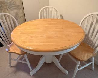 R93 - $100. Round wood top dining table. 2 chairs are good - 1 needs repair. 