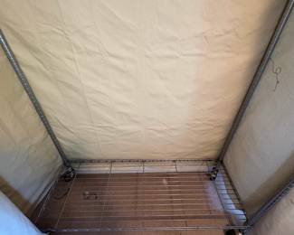 R95 - 2 Available. $75 Each. Rolling Metal Hanging Clothes Racks with Canvas Covers. 