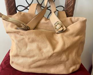 R43 - $35. Michael Kors Hudson Tan Leather Purse. Measures 16" x 4" deep x 11" tall. 