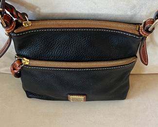 R50 - $30. Vintage Dooney & Bourke Pebble Grain Leather Crossbody Purse. Measures 8.5" x 8.25".  Clean inside. 