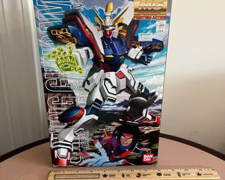 R37 - $25. Bandai MG Shining Gundam Plastic Model Kit. Open box but looks complete. 