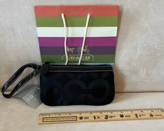 R52 - $25. Coach Signature Demi Pouch Wristlet. Vintage with tags. 