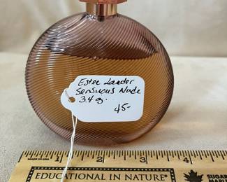 R56 - $45. Estee Lauder Sensuous Nude. 3.4 oz perfume. 