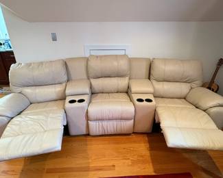 R1 - $350 Each. *2 Available* Haverty's Motion Leather Reclining Sofa. 3 seats - both ends are recliners. Moves in 5 Pieces. Assembled it is 113" long x 38" deep x 38" tall. Floor to Seat is 18.5".  These are located on the 3rd floor. YOU NEED 2 STRONG PEOPLE to move!