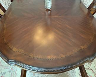 R11 - $750. Michael Amini Signature Series by AICO Hazelnut “Villagio” table & chairs wood dining table set & china cabinet.  Table does have some surface scratches and Table has 6 upholstered chairs and extendable leaf for flexible sizing. Chairs have leaf patterned fabric seats and backs, with carved wood frames.  DIMENSIONS:   Table w/ leaf 84” L x 60” W x 31”H  Leaf 24”W  Arm Chair  Seat 27.25”W x 24.25 D x 45”H  Side Chair Seat 24”W x 24.25 D x 45”H Floor to seat 19”  China Cabinet  Dimensions: 88 1/2"H x 66"W x 19"D Features Built in 3-mood touch lighting system