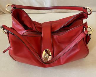 R46 - $80. Coach Carlyle Shoulder Bag Hobo Tote. Cherry Red with Gold Turnlock. Measures 14" wide x 4" deep x 11" tall. 