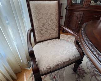 R11 - $750. Michael Amini Signature Series by AICO Hazelnut “Villagio” table & chairs wood dining table set & china cabinet.  Table does have some surface scratches and Table has 6 upholstered chairs and extendable leaf for flexible sizing. Chairs have leaf patterned fabric seats and backs, with carved wood frames.  DIMENSIONS:   Table w/ leaf 84” L x 60” W x 31”H  Leaf 24”W  Arm Chair  Seat 27.25”W x 24.25 D x 45”H  Side Chair Seat 24”W x 24.25 D x 45”H Floor to seat 19”  China Cabinet  Dimensions: 88 1/2"H x 66"W x 19"D Features Built in 3-mood touch lighting system