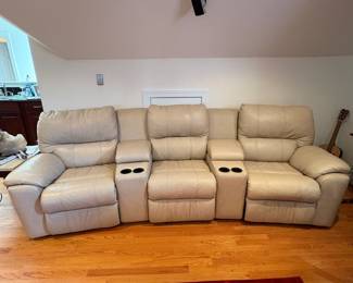 R1 - $350 Each. *2 Available* Haverty's Motion Leather Reclining Sofa. 3 seats - both ends are recliners. Moves in 5 Pieces. Assembled it is 113" long x 38" deep x 38" tall. Floor to Seat is 18.5".  These are located on the 3rd floor. YOU NEED 2 STRONG PEOPLE to move!