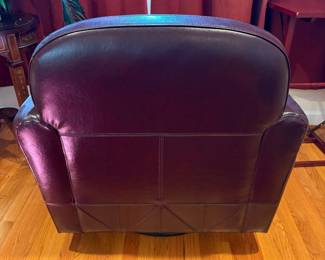 R2 - $40. Leather Swivel Chair. Brown. Measures 33" wide x 31" deep x 32" tall. Floor to seat is 18".  Seat has some cracking - arms and back are in good condition. 